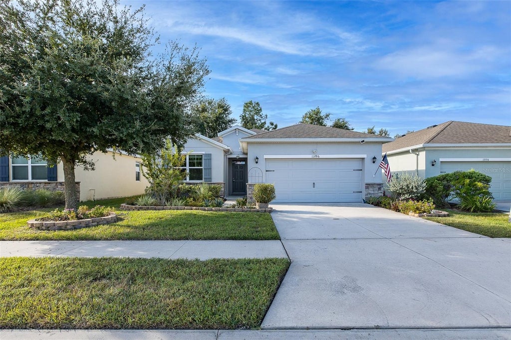 Photo of 13786 Hunting Creek Place, Spring Hill, FL 34609 (MLS # TB8551975)