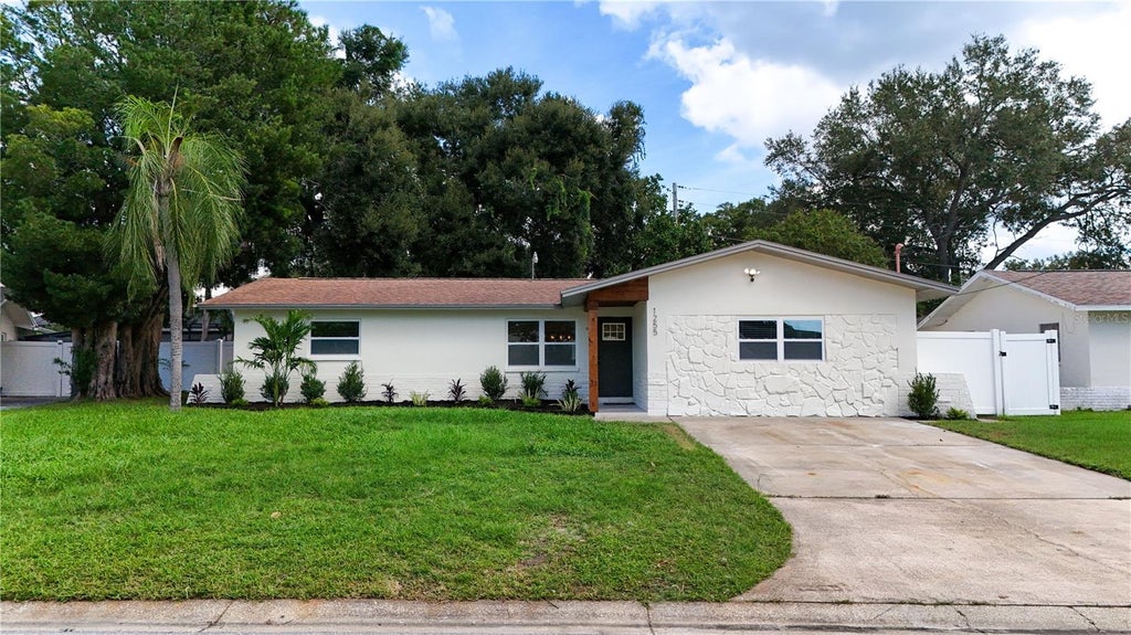 Photo of 1255 E Lazy Lake Road, Dunedin, FL 34698 (MLS # TB8552475)