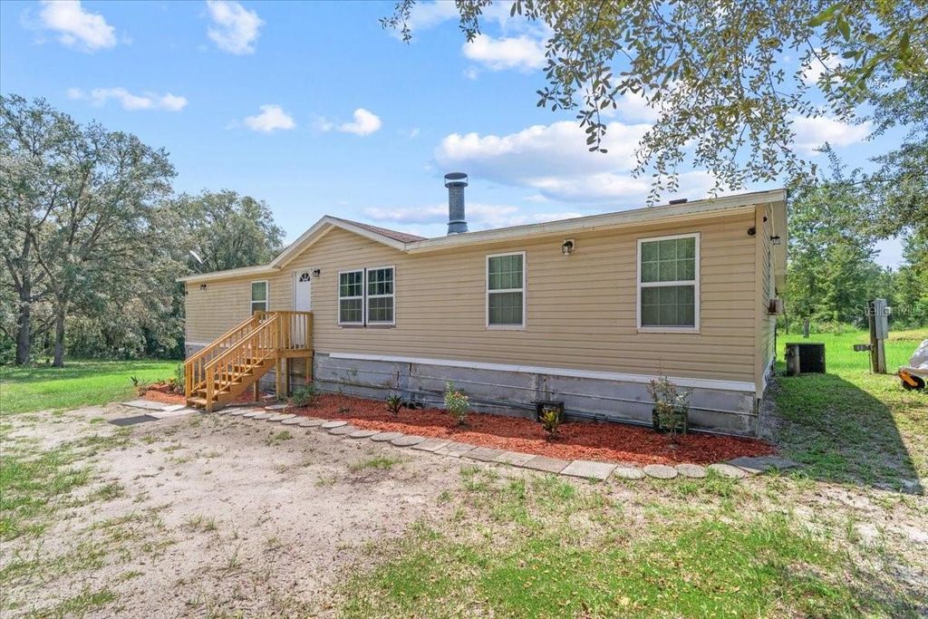 Photo of 13120 SW 90th Street, Dunnellon, FL 34432 (MLS # OM706329)