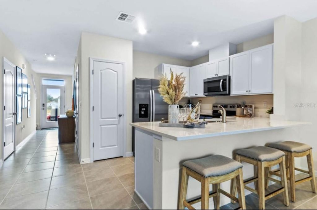 Photo of 2915 Canary Avenue, Davenport, FL 33837 (MLS # TB8457080)