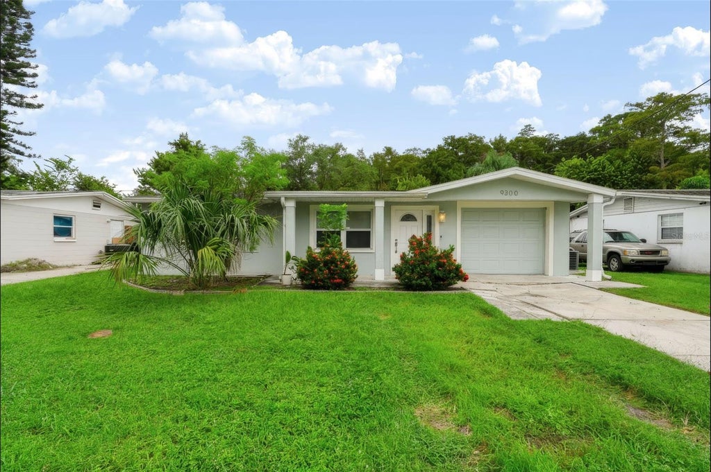 Photo of 9300 Unicorn Avenue, Port Richey, FL 34668 (MLS # TB8553343)