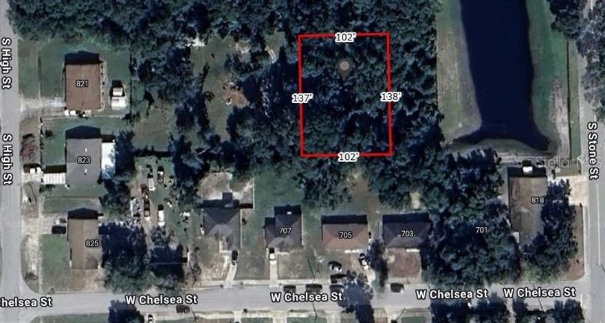 This vacant parcel of land offers a unique opportunity for future development or investment.  While it currently has no direct road access, the property provides a blank canvas with potential for creative use or long-term planning.