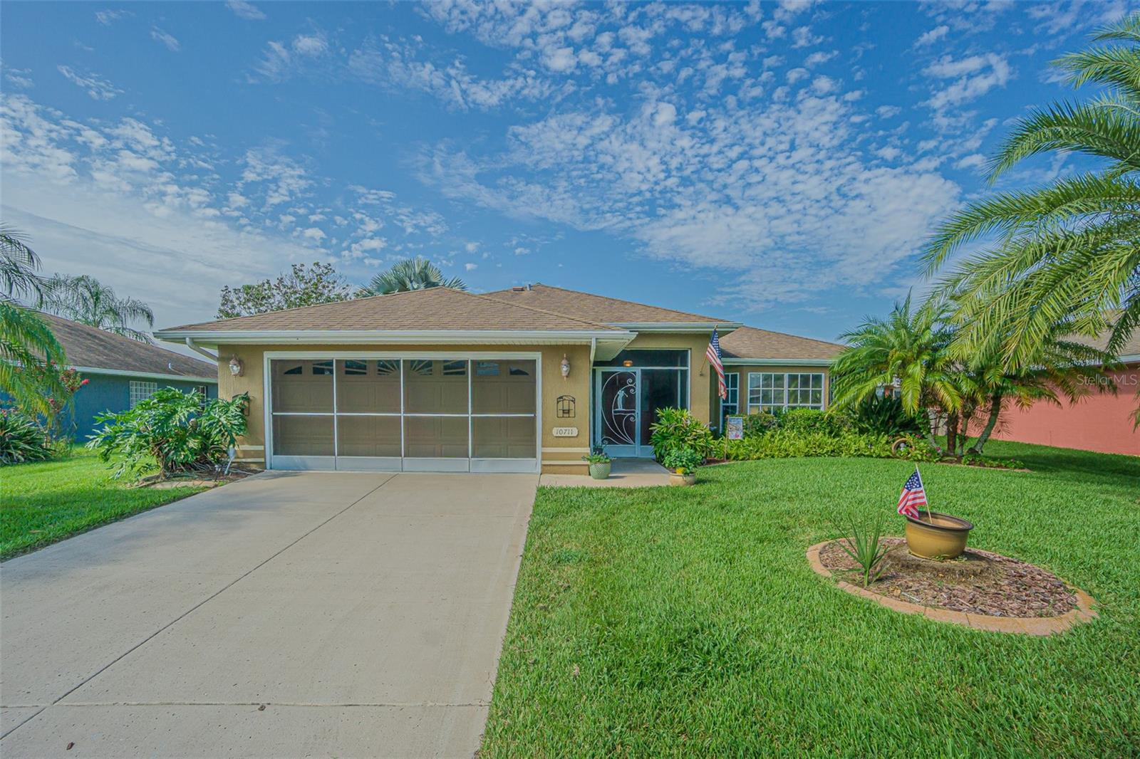 Here it is! A beautiful 3 bedroom, 2 bath 1,604 square foot home in the amazing Tampa Bay Golf & Country Club community. Enjoy the spectacular sunsets over the large pond in the backyard daily while sitting in your large, 16'X17' lanai. Inside the home, you'll love the huge living room, eat in kitchen, a large 14'X16' Primary Bedroom, the Primary bathroom features a garden tub, walk-in shower and dual sink vanity. The home has no carpet throughout, just ceramic tile, laminate and premium vinyl flooring. When you're relaxing in the gorgeous lanai, you'll soon discover why this sub-HOA is called Deer Hollow. TBG&CC has two incredible golf courses, the 18-hole Championship course and a 9-hole executive course. The golf courses here are impeccable and very well maintained. Tampa Bay Golf & Country Club is Tampa Bay's premier active 55+ community featuring two swimming pools (the large resort-style pool has fountains and is heated to a balmy 80 degrees). Pickleball, tennis, cards, bocce, shuffleboard, cornhole and more activities than anyone could possibly do! Our new activities center has a HUGE fitness center with state-of-the-art fitness equipment, a beautiful billiards room, and an amazing card room. TBG&CC has no CDD and very affordable HOA charges, which include Cable/Internet/DVR and Mini Box. The Tampa Bay Golf & Country Club community is Tampa Bay's most desirable 55+ Active community. There is a ONE-TIME charge of $3,500.00 for the Tampa Bay Community Association Social Membership due at closing. All room sizes are approximate and should be confirmed by buyer. Furniture is available outside of contract.