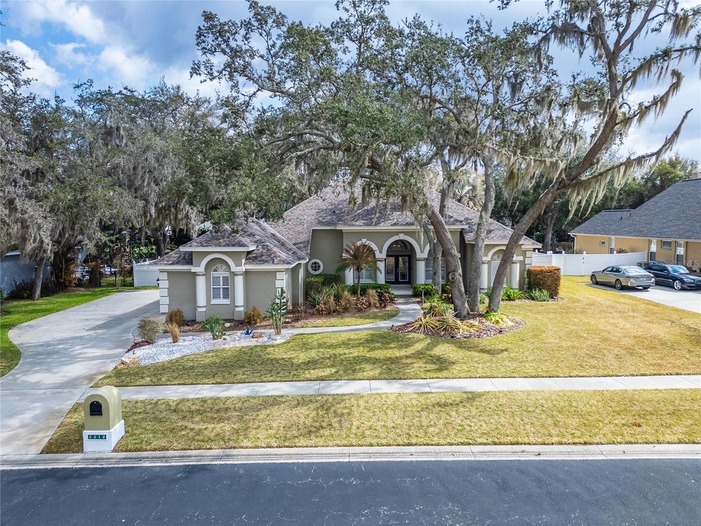 Photo of 5018 Sylvan Oaks Drive, Valrico, FL 33596 (MLS # TB8475858)