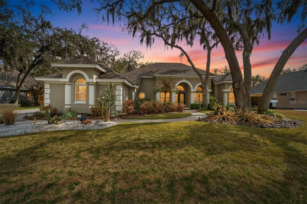 Photo of 5018 Sylvan Oaks Drive, Valrico, FL 33596 (MLS # TB8475858)