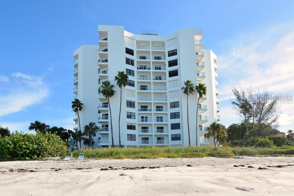 Available 07/15/2025 through 12/30/2025. LEASED SEASON JAN, 2026 THROUGH MARCH, 2026. This residence is gulf and bay views through your hurricane sliding doors and a view from every room. Pristine sandy beaches from a luxurious direct front gulf complex. Located in the gated Longboat Key club and Resort. A spacious 2 bedroom, 2 bathroom unit turn-key furnished. Both bedrooms have private lanais, walk in closets. Double queen beds in one of the ensuites. open floor plan features large eat in area with granite counters neutral tile floors, and extra storage outside unit. Laundry is located right outside of your unit. Covered Carport and guest parking available. Building amenities WIFI, renovated social room and fitness center. Resort style living with heated Olympic size pool, tennis courts, biking trails, and outside showers. Enjoy the Publix Grocery just minutes away along with many restaurants for fine dining. This building is located the furthest South end of Longboat Key so you miss a lot of traffic. Just minutes to St. Armand's Circle for shopping, restaurants and entertaining. Enjoy Lido Beach also just minutes away.