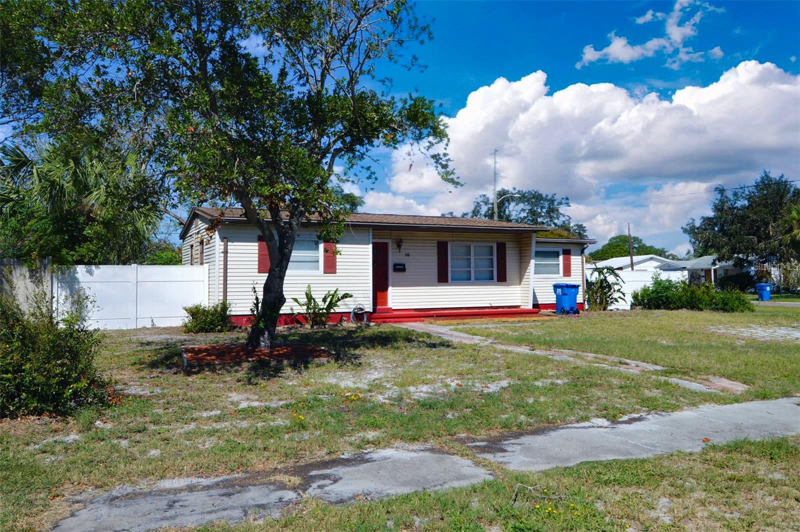 This home is a 3bed/2bath with HUGE fenced-in backyard. Features are espresso wood kitchen cabinets, granite countertops, tile backsplash, full size washer & dryer with outside laundry room & storage room, high ceilings, built in shelves, master bedroom and bathroom ( with stand up shower) is on one side of the house that also has another door entrance to backyard and the other bedrooms and bathroom ( with tub/shower) is on the other side of the home. Wood floors throughout, and a huge fenced in backyard and shed. Pets are welcomed. Great location just mins from shopping, Restaurants, I-275, SPC campus, Pinellas Trail, Downtown St. Pete, Beaches and much more.