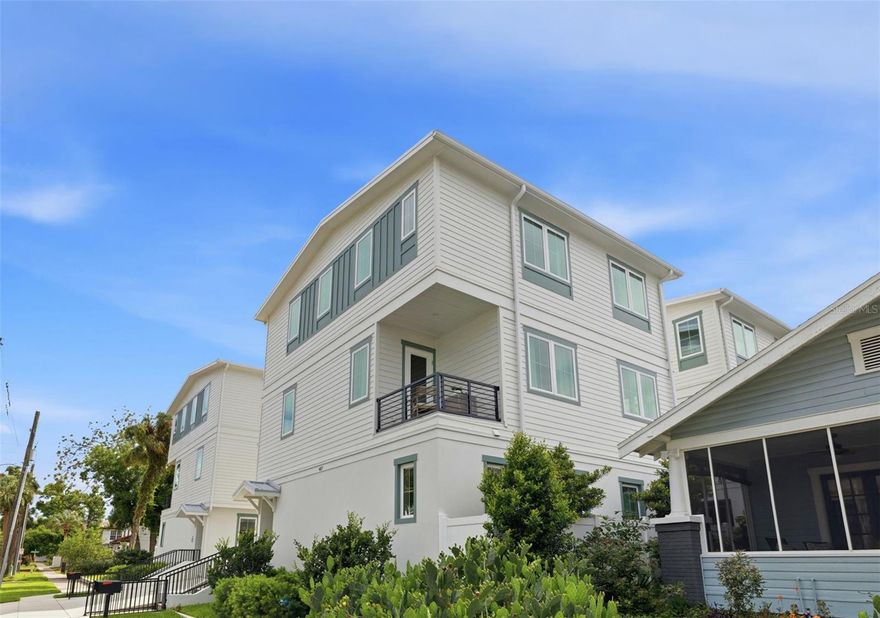 Introducing a rare opportunity to own a move-in ready, DETACHED new construction HOME in the heart of South Tampa’s highly sought-after SOHO district. This exclusive community features just six residences, with Units 1, 2, 4, and 5 currently available. Unit 1 stands out as a detached townhome, offering added privacy with no shared walls, an exceptional feature rarely found in this area for a townhouse. Upon entry, you’re welcomed by a private first-floor guest bedroom complete with an en-suite bath and direct access to a covered patio and fenced green space, perfect for guests or a home office retreat. The second level showcases a bright and expansive open-concept layout, seamlessly blending the living, dining, and kitchen areas. Natural light pours in through large windows, highlighting the light wood flooring and elevated finishes throughout. A stylish half bath and covered balcony make this level ideal for entertaining. The designer kitchen is both functional and striking, featuring stone countertops, a tile backsplash, bronze hardware, stainless steel appliances, abundant cabinetry, and a spacious walk-in pantry. Upstairs, the third level offers a thoughtfully designed layout with a generous laundry room, an additional guest suite with a private bath, and a luxurious primary suite. The primary retreat is filled with natural light and features dual walk-in closets and a spa-inspired bathroom with a double vanity and an oversized walk-in shower with a soaking tub for a true retreat experience. Additional highlights include a spacious two-car garage and a private driveway. The unbeatable location places you just steps from South Howard Avenue’s vibrant dining and nightlife, with Hyde Park, Bayshore Boulevard, and Downtown Tampa all just minutes away. Experience elevated living in one of South Tampa’s most desirable neighborhoods. Schedule your private tour today!