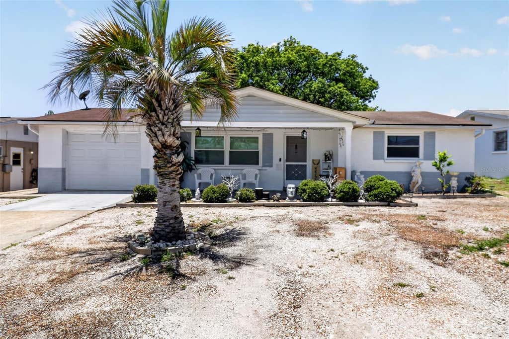 Photo of 3625 Cockatoo Drive, New Port Richey, FL 34652 (MLS # TB8517449)