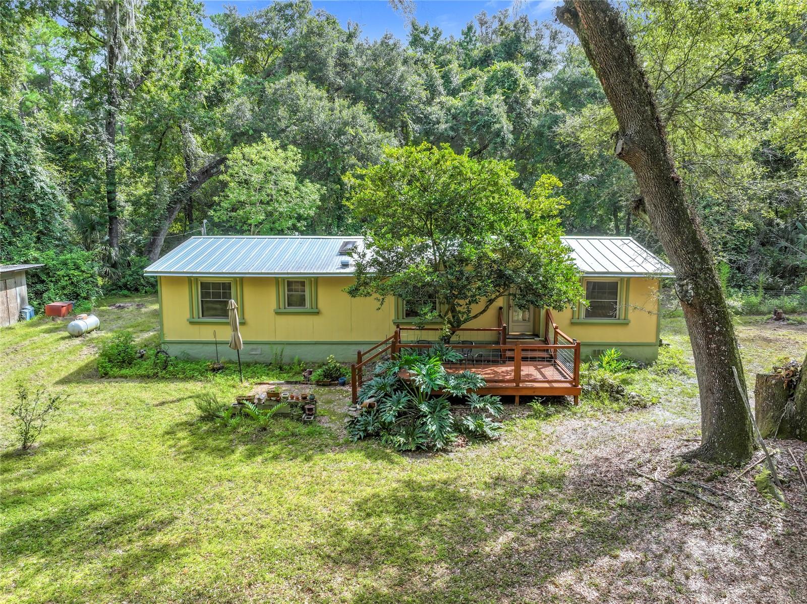 Looking for space to spread out? This 3 bedroom, 2 bathroom mobile home sits on a huge 10-acre property. There’s plenty of room for animals, gardens, four-wheelers, or just enjoying peace and quiet. The home has a split floor plan, a spacious kitchen, and a big living area. This property also has great extras that make country living even easier. There’s a propane tank that’s filled and serviced every year, a well with a water softener that’s also taken care of yearly, and an RV hook-up in the shed—perfect for guests or extra storage needs. Whether you want to start a small farm, build your dream home later, or just enjoy wide open space, this land gives you tons of options. If you’ve been dreaming of quiet country life with room to grow, this could be the perfect place for you!