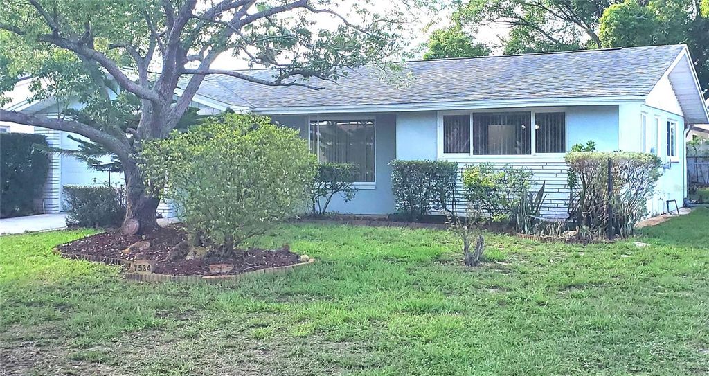 Photo of 7534 Rosewood Drive, Port Richey, FL 34668 (MLS # TB8512989)