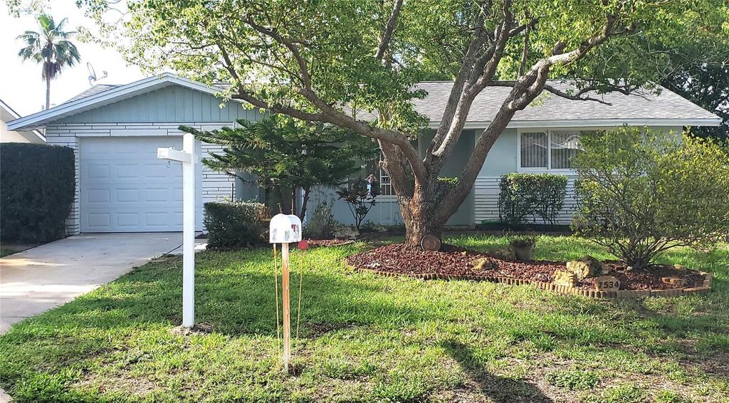 Photo of 7534 Rosewood Drive, Port Richey, FL 34668 (MLS # TB8512989)