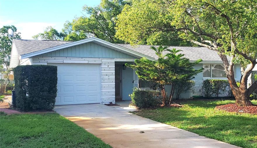 Located in the desirable Jasmine Lakes community, this well-maintained home features a Newly Remodeled Kitchen with Quartz countertops and all-New Stainless-Steel Appliances. Both Bathrooms have also been fully renovated. The home offers two bedrooms, two bathrooms, a spacious lanai, and an open layout connecting the kitchen, dining area, and living room. Added highlights include a separate dining room, spacious living room, generous cabinet and closet space and full size one car garage. The rear lanai opens to a fenced yard, perfect for relaxing and outdoor entertainment. Major updates include a new roof in 2015, a new A/C in 2018, and newer windows and doors. Clean and move-in ready, this home is waiting for your individualized touch. Jasmine Lakes is about 40 minutes from Tampa International Airport and only 10 minutes from waterfront destinations such as Miller’s Bayou, Robert K. Rees Park, and nearby beaches. Shopping, dining, and everyday conveniences are also close by. Schedule your showing today!