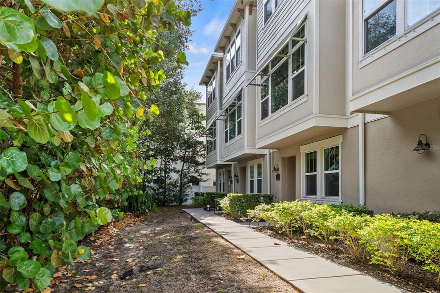 Welcome home to this beautifully maintained townhome in the heart of South Tampa and the highly desired Plant High School District. The home has been upgraded to add detail and comfort, and is walking distance to many restaurants, boutiques, and community events. It boasts 3 bedrooms, 3 1/2 baths, high-ceilings, a spacious master suite, and an open floor plan making it an ideal retreat for entertaining and families alike. The living area has been recently upgraded with built-in detail and additional seating by the large front windows. The thoughtful layout, tall ceilings, and 8-foot doors on all levels create an opulent feel. Enjoy the 2-car garage on the ground floor along with the 3rd Bedroom ideal as an office or in-law suite with its own full bathroom. Walking up the gorgeous wooden stairs brings you to the open layout of the large kitchen with gas range along with all stainless appliances and deep double sinks. The central dining room with beautiful wooden beams and grand living room round out the rest of the second level. The third floor welcomes you to the master suite, complete with crown molding, tray ceiling, walk in closet, dual sinks, and stylish large shower with separate tub. The third floor also has Bedroom 2 with en suite bathroom and laundry room located conveniently nearby the bedrooms.