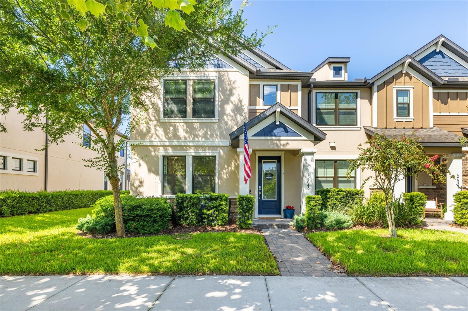 STUNNING 3 bedroom + HOME OFFICE townhome in sought after Starkey Ranch, a community known for its amenities and picturesque, natural setting. This END-UNIT is loaded with DESIGNER features and high-end touches. Ample windows provide natural light, which compliments the fresh, neutral colors and MODEL-HOME FEEL. Gorgeous wood-like tile floors throughout the living space, upgraded fixtures, paneling – and even a fireplace – make the home warm and inviting. The HGTV-worthy kitchen features a gas stove, closet pantry with glass door and built-in solid shelving, center island, premium quartz countertops, under cabinet lighting, as well as upgraded cabinetry with extra drawers and speckled glass doors. The home’s open-concept floorplan is perfect for living and entertaining. Enjoy CONSERVATION / WATER VIEWS from the home office – or use this space as a den, playroom or possibly convert it to a 4th bedroom. The spacious primary bedroom features a tasteful ensuite bath and walk-in-closet. The screened lanai and 16-foot retractable sunshade over the courtyard provide generous OUTDOOR LIVING space. Grill masters can take advantage of the natural gas hookup for even more culinary and entertaining options. FULLY AIR CONDITIONED GARAGE with removable carpet tiles is perfect for a HOME GYM, WORKSHOP, or PLAYROOM. You can turn off the separate AC unit when not in use. Other upgrades include fireplace, smart-home dimmer switches and doorbell with 2 cameras, whole-home surge protector and water softener, reverse osmosis drinking water system in the kitchen, overhead bins and wall shelves in the garage, a tankless hot-water heater and gas dryer. (Washer and dryer are both included!) All this in a community known for 22 miles of walking/biking trails set amidst conservation lands, lakes and parks. It also has 3 pools, a splash pad, playgrounds, dog parks, tennis courts, a community garden – as well as soccer, football, lacrosse, softball and baseball fields in the District Park. There’s even an A-rated K-8 MAGNET SCHOOL in the community. Publix and shopping are minutes away in the Town Square. Easy access to the Suncoast Parkway/Veterans Expressway and US 19, putting Tampa Airport and even Sunset Beach only 30 minutes away. LOW HOA dues cover exterior maintenance and the roof, landscaping, irrigation with reclaimed water, and pest control for a LOW MAINTENANCE LIFESTYLE. This one is sure to impress – schedule your showing today!