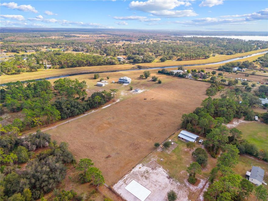 Rare opportunity to own 7.63 acres in the desirable St. Cloud Manor area. This beautiful property is cleared, fully fenced and ready for you to build your custom dream home. Enjoy the freedom to bring your boat, RV and outdoor recreational toys as there is NO HOA restrictions! With wide open space and endless possibilities, this property is perfect for creating your ideal lifestyle. An additional opportunity exists with the 6.51 acres next to the the property that features a large custom home and is available for purchase, offering the opportunity for expanded acreage. Buyer and/or buyers agent responsible for verifying any/all information including but not limited to taxes, HOA, zoning, acreage etc.