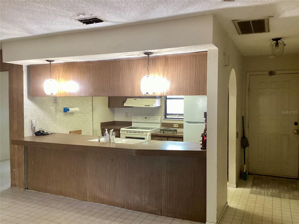 Photo of 12830 Lake Tree Lane, Hudson, FL 34669 (MLS # W7885441)