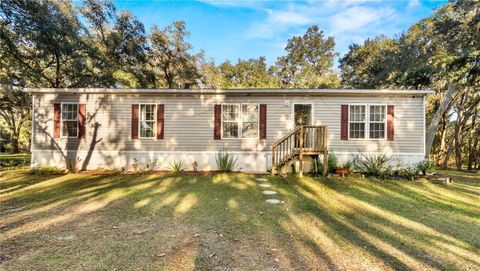 Photo of 5755 N Highland Park Drive, Hernando, FL 34442 (MLS # OM714580)
