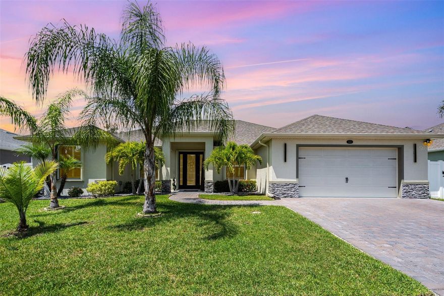 Only fourteen families get to call Hawks Ridge home. Tucked behind the gates of this boutique enclave, this 2020 build delivers privacy, style, and everyday ease across 4 bedrooms and 2,244 sq ft of living space. Sunlight fills an open plan anchored by a custom kitchen with quartz counters, a center island, soft close drawers, pull outs in the cabinets, and stainless steel appliances. Split plantation shutters frame the front windows and custom blinds and shades finish the rest.

The primary suite is a true retreat with two custom walk in closets and a spa style bath featuring a frameless glass shower and an extended double vanity. Fresh brand new carpet in the primary bedroom adds a crisp, move in ready feel, while crown molding and custom laminate flooring elevate the main living and dining areas. An additional walk in closet in the middle bedroom delivers the bonus storage everyone wants.

Outdoor living steals the show with an oversized 34'6" x 18' covered, screened porch that lives like a second living room. Out back you will find a fully fenced yard, a shed for easy storage, and all the space you need to enjoy the outdoors.

Quality details bring peace of mind, including accordion hurricane shutters, Cat 5 hurricane screens on the patio, a whole home water filtration system, and exterior cameras with two floodlight units plus a Ring camera. Comfort height elongated toilets in both baths are a thoughtful touch.

Location seals it. Hawks Ridge puts you close to everyday shopping and dining, parks and nature trails, and quick routes to area beaches and major employers. It is privacy, convenience, and lifestyle in one address. Homes in this community are rarely available. This one is ready for you.