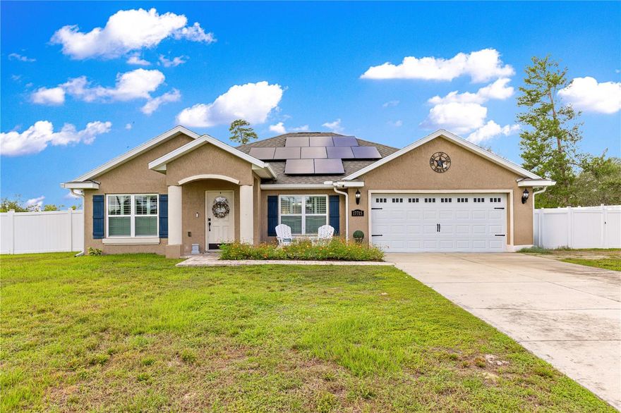 Welcome to this charming POOL & SOLAR home less than 5 years old with no HOA!  This home includes 1936 sq ft under heat and AC with 3 bedrooms, 2 bathrooms, and that all important extra room usually used for an office, but could be used as a bedroom in a pinch.  Discover your dream home in this beautifully designed single-story residence, situated on a fully fenced oversized lot with no side or rear neighbors, which offers the ultimate privacy and tranquility.  This home boasts a host of modern and practical features, making it ideal for comfortable living and self-sufficient homesteading.  Key Features would include a durable block exterior with high-efficiency windows and SOLAR panels for energy savings, complemented by gutters and an irrigation system for easy maintenance. This gorgeous lot provides security and ample space, complete with an extra large shed (12' x 32' with double lofted barn cabin and front porch) for storage or workshop needs. Here there lies a perfect opportunity to start your homesteading paradise already with established fruit trees including Mandarin Orange, Tangelo, Chinese/Japanese Plum, Florida Peach, Sweet Lemon (Bitter Orange), Meyer Lemon, Key Lime, Golden Apple, and Anna Apple. Also included are raised garden beds and a chicken coop to make this property a homesteader’s delight.  Some interior highlights feature an open concept including vaulted ceilings and elegant tray ceilings. The spacious office is perfect for remote work or study.  Plantation shutters add a touch of elegance while also enhancing privacy.  The kitchen shines with stainless steel appliances, soft-close cabinetry, and a convenient mini fridge to help out with entertaining family and friends.  The primary bedroom comes equip with a relaxing garden tub (non-jetted but prewired for jets if desired) or just refresh in the walk-in shower.  Take a dip into the sparkling POOL, perfect for cooling off or entertaining guests. This unique property offers a rare blend of modern comforts and homesteading potential, all in the most peaceful setting. Don’t miss the chance to own this exceptional home, so schedule a showing today.  Also, don't forget to ask about the zero money down financing option to make this home yours with ease.  Don't miss out!