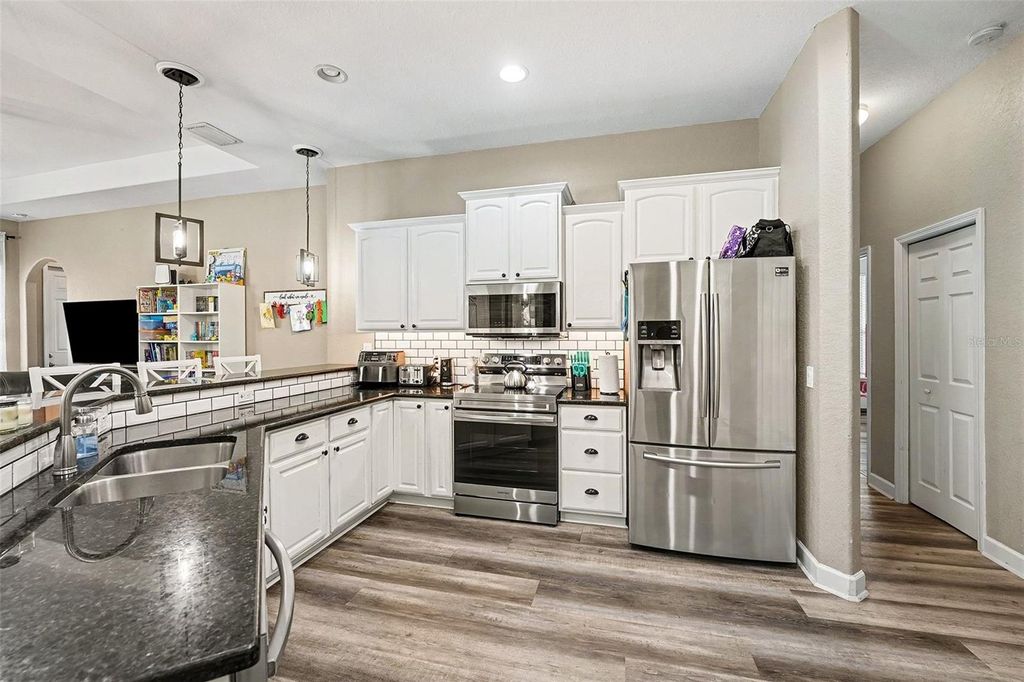 Photo of 5685 Lake Victoria Drive, Lakeland, FL 33813 (MLS # TB8464954)