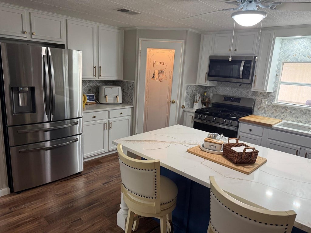 Photo of 109 N Saint Thomas Circle, Apollo Beach, FL 33572 (MLS # TB8551352)