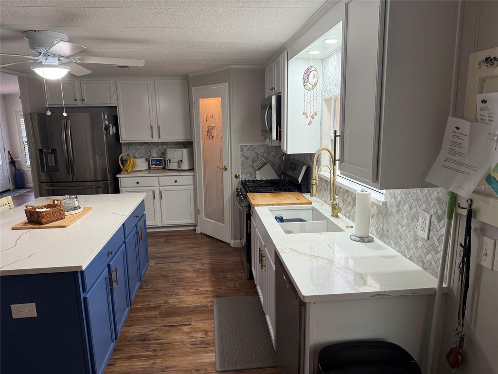 Photo of 109 N Saint Thomas Circle, Apollo Beach, FL 33572 (MLS # TB8551352)