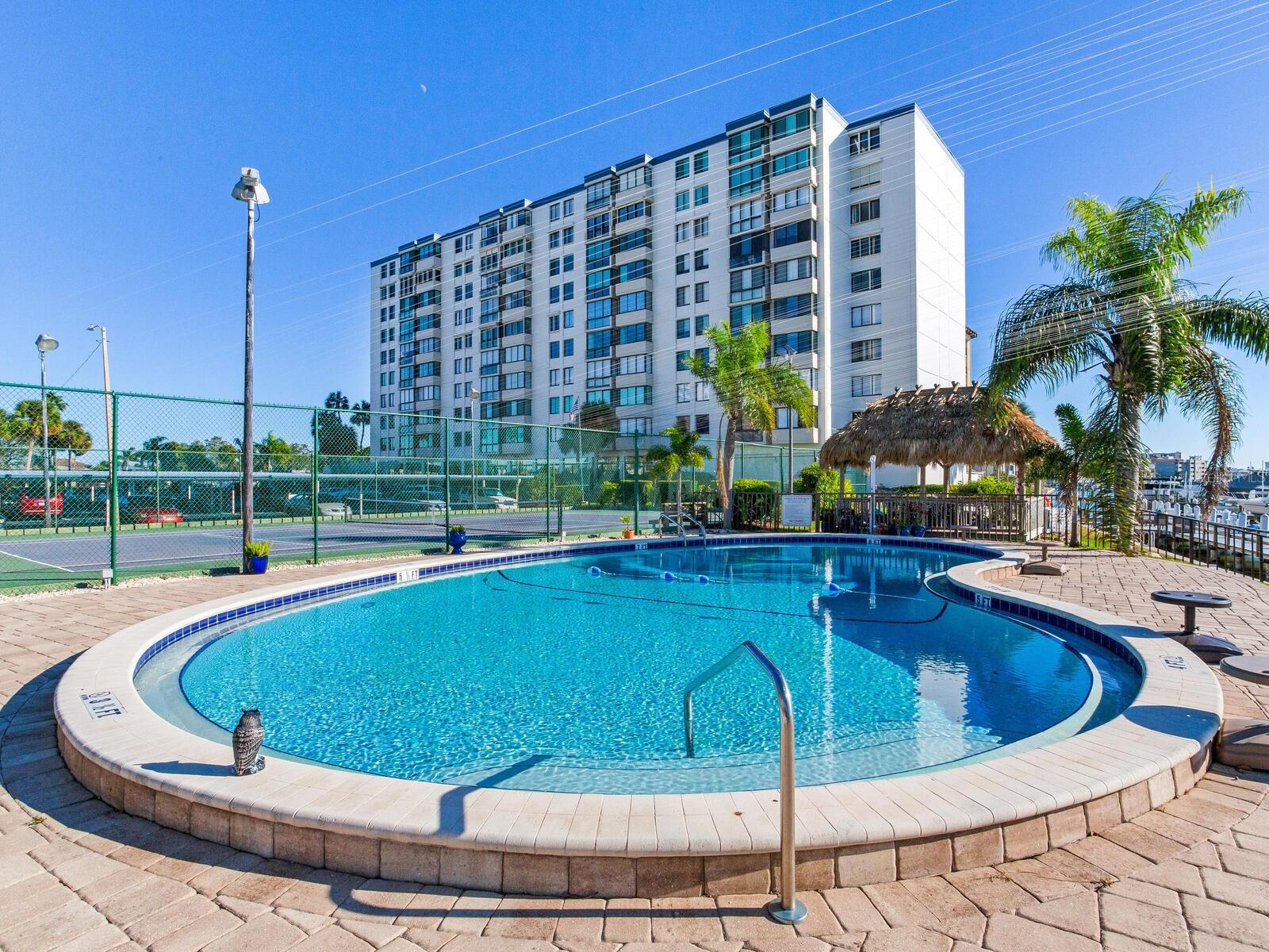 ** MILESTONE INSPECTION STUDY HAS BEEN COMPLETED & BUILDING PASSED INSPECTION! **
Enjoy this gorgeous, turnkey, bright, and light, completely renovated 2-bedroom, 2-bath condo with an open floor plan. Located on the 3rd floor of Diamond Isle Condo on Island Estates in Clearwater Beach, it boasts stunning water views overlooking sparkling Clearwater Harbor, the Intracoastal Waterway, and seasonal sunsets over Clearwater Beach.
This spacious condo features a large living room, dining room, and a separate breakfast nook that can be used as a study or office. The kitchen has been thoughtfully remodeled with quartz countertops and newer stainless-steel appliances, including a new washer and dryer. Additional updates include all new windows (2022), new luxury vinyl floors (2022), electric shades with blackout curtains in the living and dining rooms with remote control (2022), a new air conditioner (2023), a new water heater (2022), new closet doors (2022), new lighting (2022), all new outlets, new paint throughout the condo (2021), and a separate ice maker in a large closet pantry. There is ample storage space in the kitchen pantry and built-in closet organizers throughout.
Enjoy all the building amenities, such as a gym, locker rooms with a sauna, a billiard room, a spacious clubroom, and more. Outside amenities include a tennis court, a waterfront heated swimming pool, a Tiki Hut with a BBQ grill, and a community dock great for fishing. For boaters, boat slips are available on a first-come, first-served basis, rented out by the association at a low cost of $190 per/month. If you desire to install a boat lift, it would be at the buyer's expense.
Other features include an assigned parking space (#2), a pet-friendly community (with a 20 lbs. max weight), and the condo can be leased after 1 year of ownership. Furnishings are included in the sale.
The Diamond Isle Condo Community is located in the beautiful Island Estates community, close to shopping, restaurants, a grocery store, banks, salons, and just a short drive, bike, or Jolly Trolley ride to beautiful new Coachman Park & to the world-renowned sugar sand beaches of Clearwater Beach.