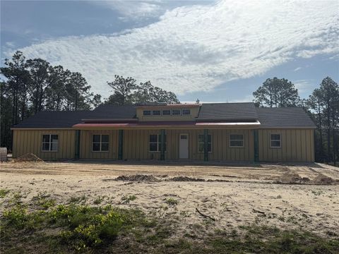 Photo of 8730 NW 17th Circle, Ocala, FL 34475 (MLS # O6404832)
