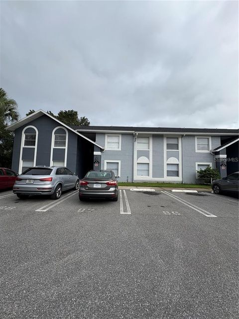 Photo of 4136 Pershing Pointe Place #3, Orlando, FL 32822 (MLS # R4910837)