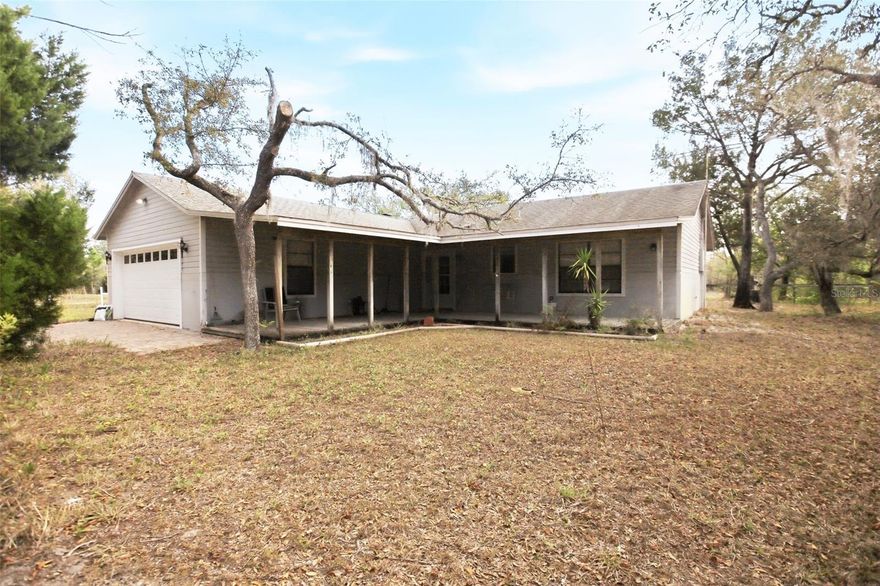 Welcome to your own slice of peaceful paradise at 4095 Pioneer Way in beautiful New Smyrna Beach. Nestled on over 5 acres of fully fenced land, this charming 3-bedroom, 3-bath home offers the perfect balance of privacy, functionality, and natural beauty.  Surrounded by mature trees and open pasture, this property is a dream for horse enthusiasts and animal lovers, featuring six horse paddocks and ample space for additional livestock, recreation, or expansion. Whether you're enjoying your morning coffee or unwinding at sunset, you’ll love watching deer and wild turkey roam freely across your land, creating a truly serene, nature-filled setting.  Inside, the home exudes warmth and character with a beautiful rock-wall fireplace as the centerpiece of the living space, complemented by recessed lighting that enhances the inviting atmosphere. The thoughtfully designed layout offers comfortable living with approximately 1,768 sq ft, perfect for both everyday living and entertaining.  Step outside to enjoy a variety of outdoor features, including a patio, porch, and pool area, ideal for relaxing or hosting gatherings in your private backyard oasis. A storage building and generous acreage provide flexibility for hobbies, equipment, or future improvements.  Located in a quiet, rural setting yet just minutes from town, this property offers the best of both worlds—peaceful country living with convenient access to shopping, dining, and top-rated schools. It’s the perfect place to raise a family, enjoy wide-open spaces, and embrace the Florida lifestyle.