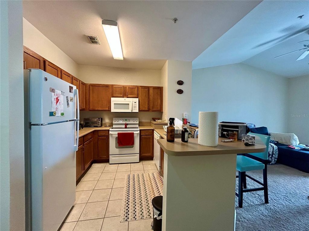 Photo of 8112 Claire Ann Drive #302, Orlando, FL 32825 (MLS # O6416168)