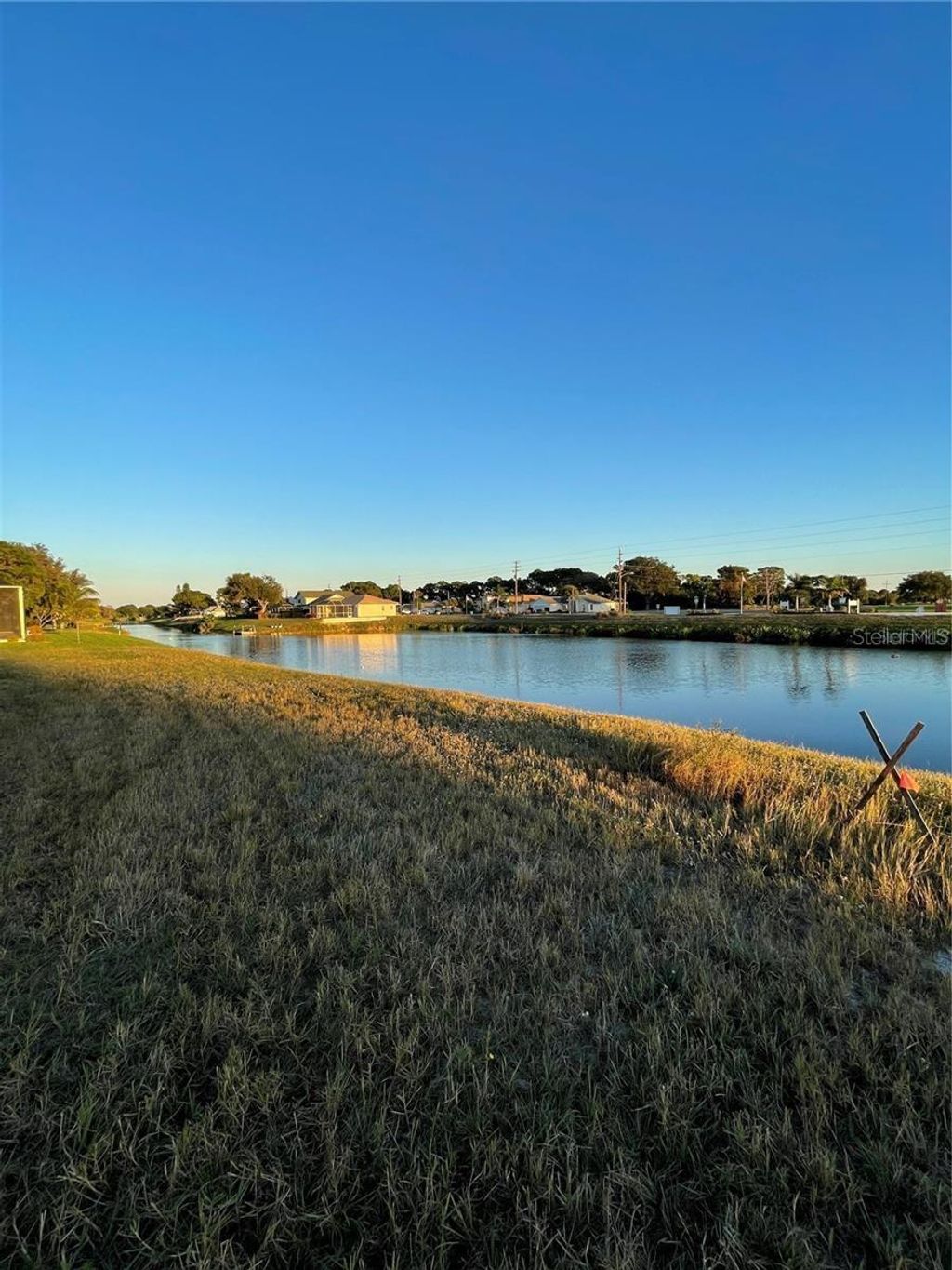 Photo of 470 Boundary Boulevard, Rotonda West, FL 33947 (MLS # A4652680)