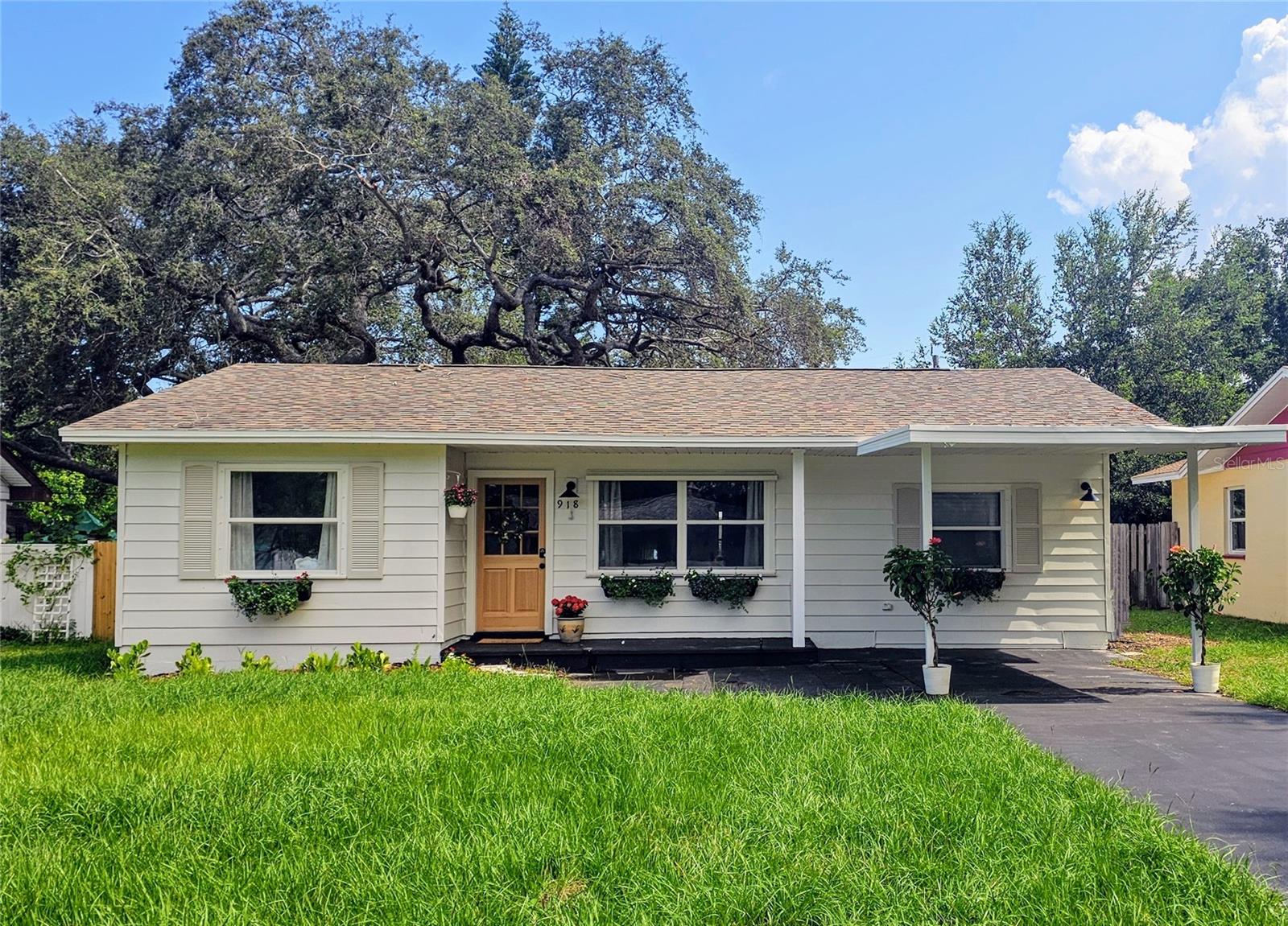 Location, location, location! Charming 3BR/2BA home on a quiet, sidewalk-lined street just minutes from downtown Largo, parks, shops, & world-famous Gulf beaches. Enjoy new LVP flooring, a fully renovated kitchen with new stainless steel appliances & butcher block counters, timeless fixtures, newly renovated/updated baths, fresh interior/exterior paint, & new landscaping with sod. Bonus 300sf enclosed sunroom with A/C (not included in total). Primary suite has attached bath. Turn key and ready!