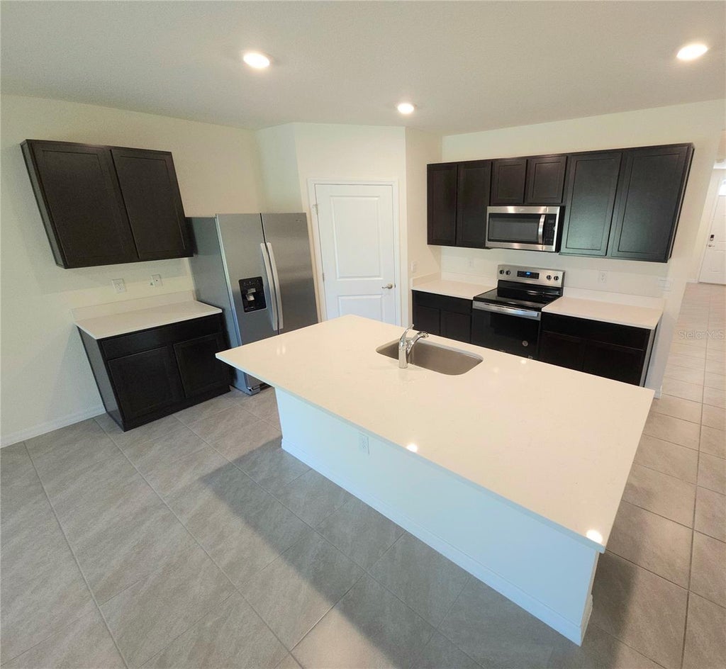 Photo of 296 Hickory Course Trail, Ocala, FL 34472 (MLS # O6423359)