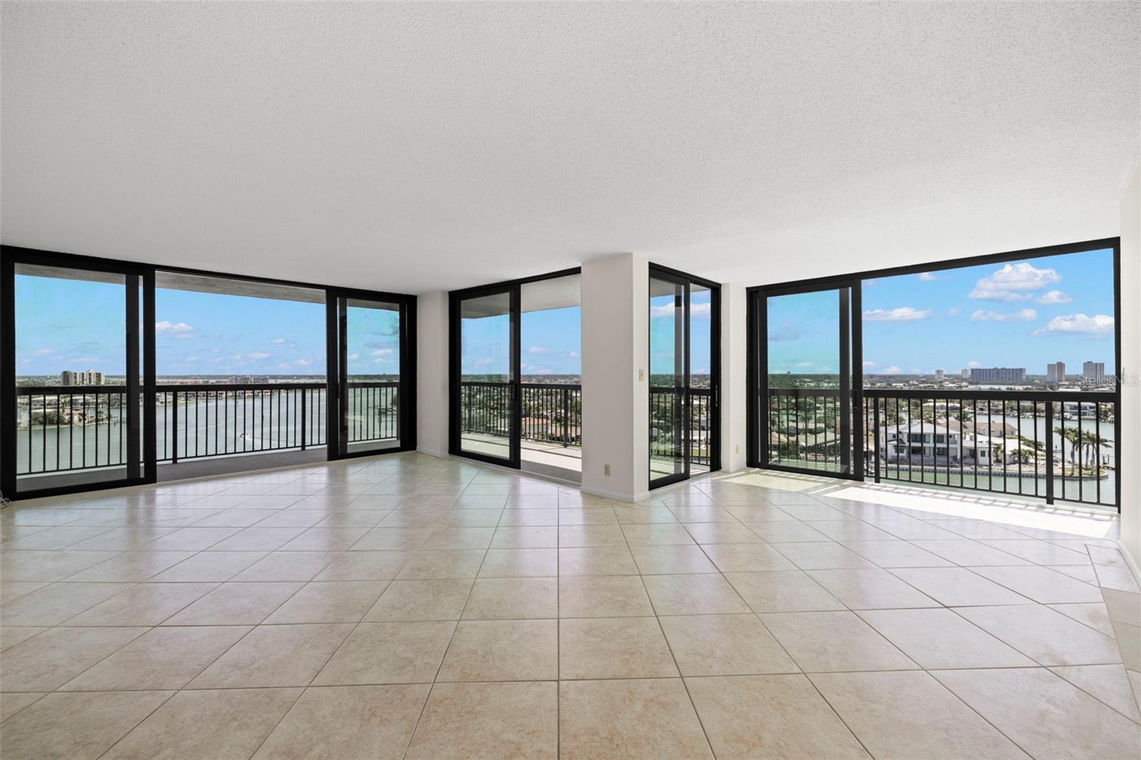 Living Room with walls of glass and wrap around balcony