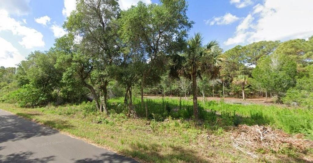 Photo of 1457 Candy Lane, Port Charlotte, FL 33953 (MLS # O6328667)