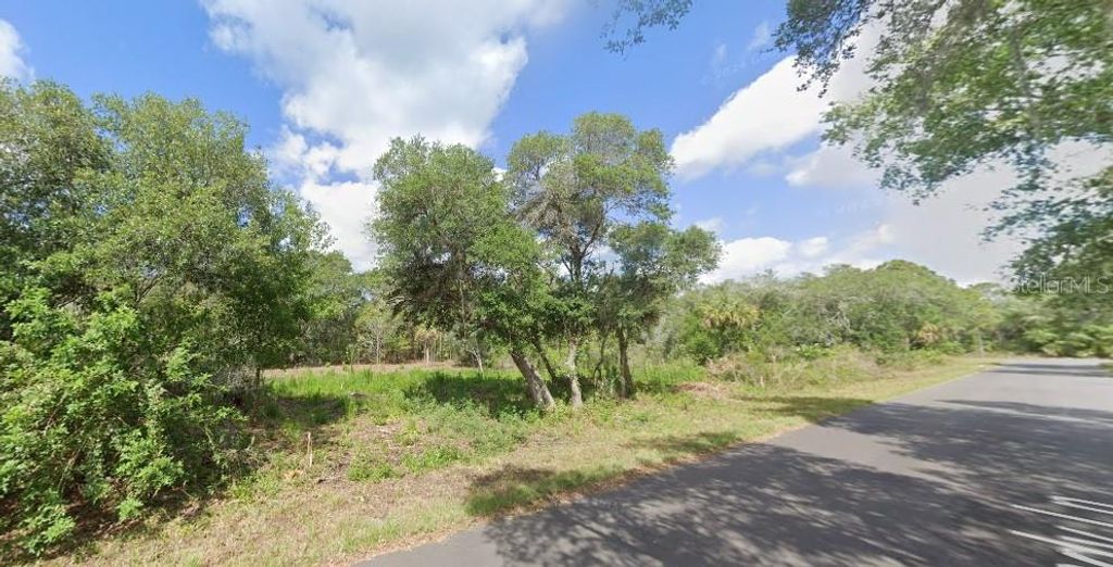 Photo of 1457 Candy Lane, Port Charlotte, FL 33953 (MLS # O6328667)