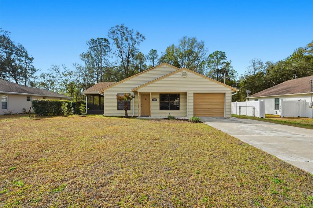 Photo of 21174 SW Peach Blossom Street, Dunnellon, FL 34431 (MLS # W7883218)
