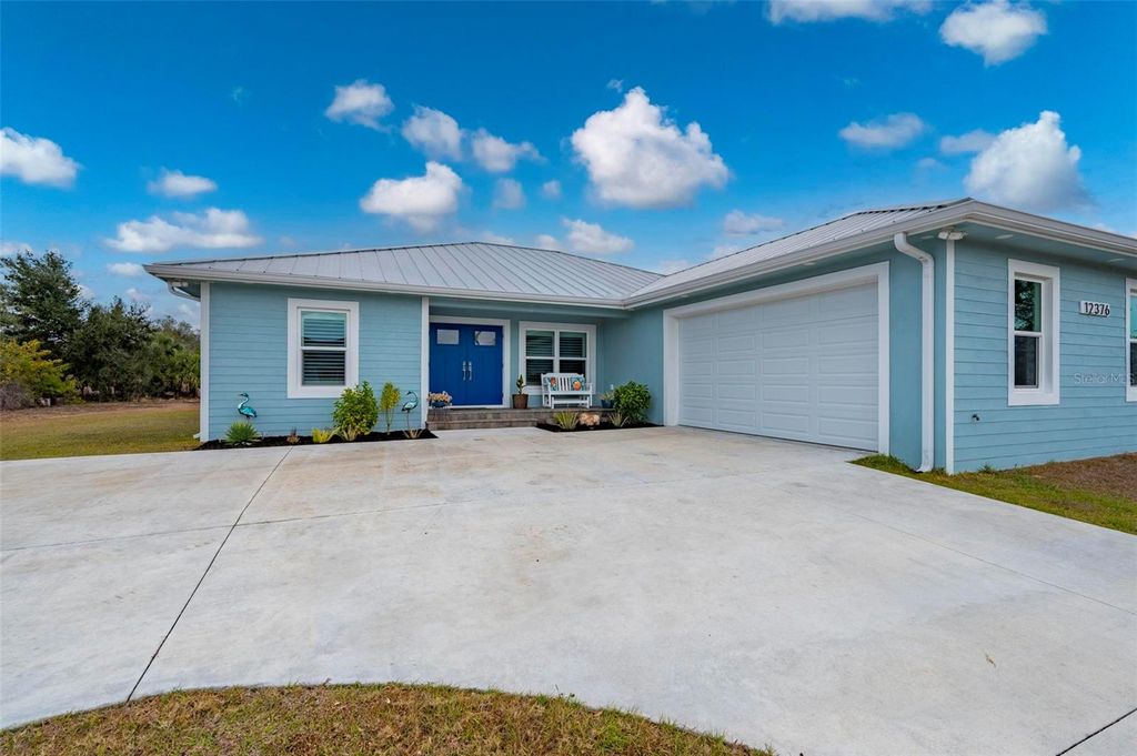 Photo of 12376 Oakner Street, Port Charlotte, FL 33981 (MLS # C7521643)
