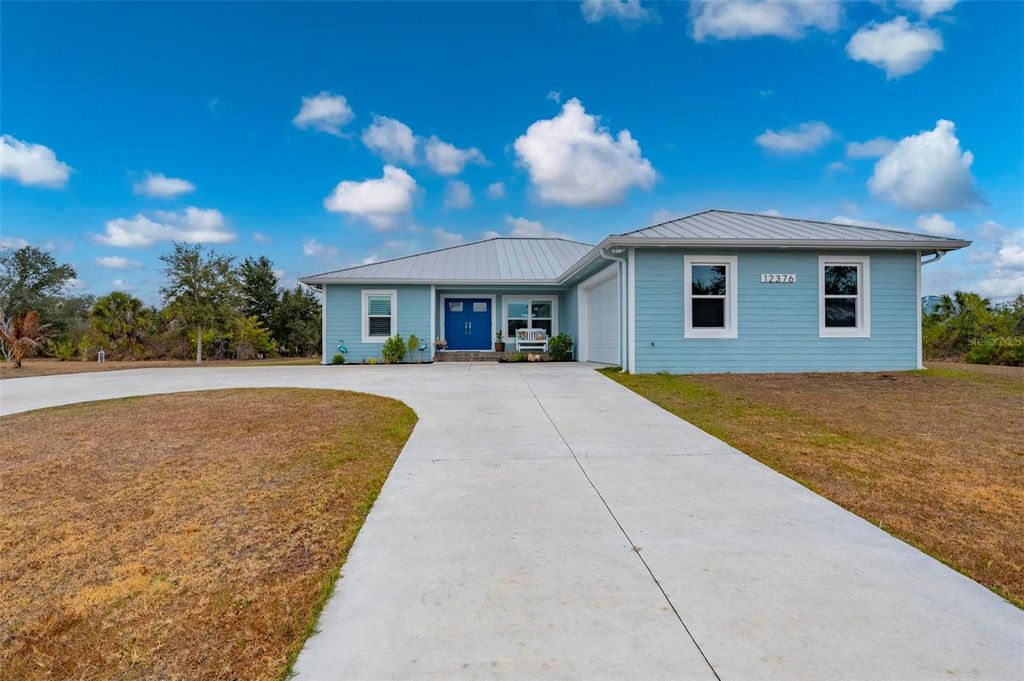 Photo of 12376 Oakner Street, Port Charlotte, FL 33981 (MLS # C7521643)