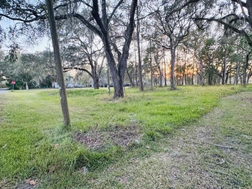 NO HOA! Vacant Land in Brookeville. This residential corner lot just under ½ acre, ideally located in Brooksville right off Broad Street with convenient access to shopping, dining, and local amenities. This homesite is ready for your vision, featuring an existing septic system and drain field (buyer to verify condition and suitability), as well as an electric pole already on the property.  This property offers a unique opportunity, as it may be purchased individually or together with an additional adjacent vacant lot owned by the seller, zoned Commercial PDP for office/professional use. The seller is open to making available a package deal—perfect for those looking to live next to their investment.  It is situated across from Hernando County Airport and bordered by an established residential community to the east; this location offers both convenience and potential. Whether you’re planning to build your dream home or explore a combined residential and business opportunity, this property is ready to bring your plans to life.  Additional Property is MLS# G5105810
