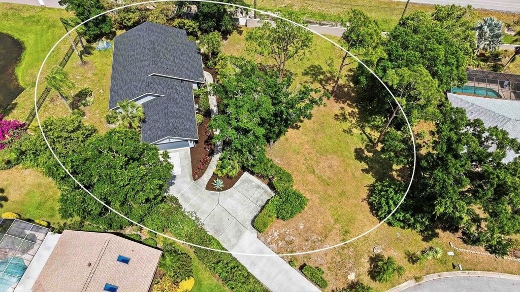 Photo of 8021 Timber Lake Lane, Sarasota, FL 34243 (MLS # A4690940)