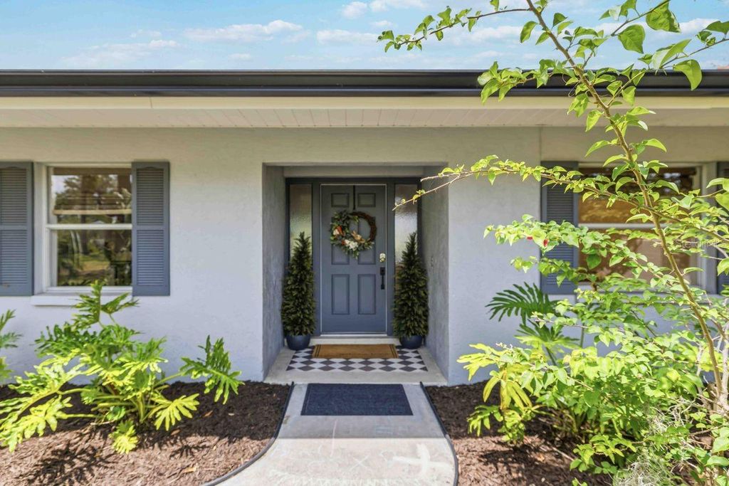 Photo of 8021 Timber Lake Lane, Sarasota, FL 34243 (MLS # A4690940)
