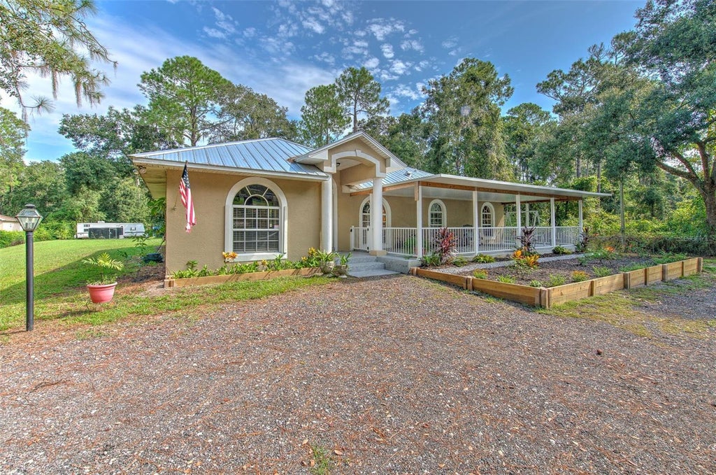 Photo of 118 E Hunter Road, Plant City, FL 33565 (MLS # TB8561010)