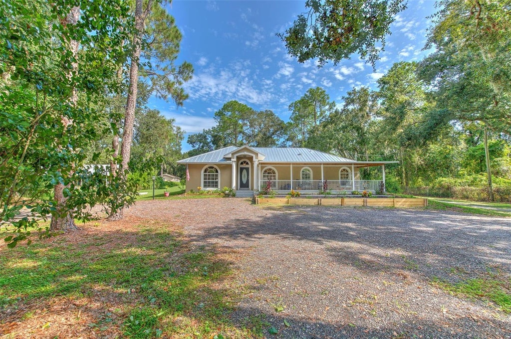Photo of 118 E Hunter Road, Plant City, FL 33565 (MLS # TB8561010)