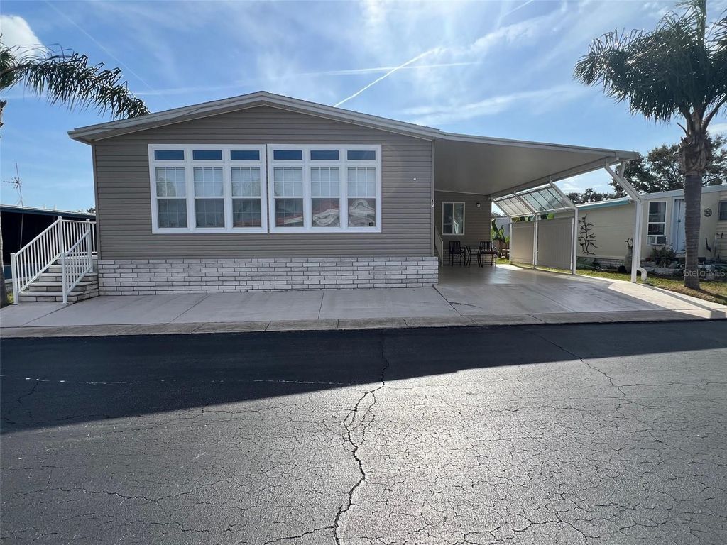 Photo of 12651 Seminole Boulevard #4F, Largo, FL 33778 (MLS # TB8453519)