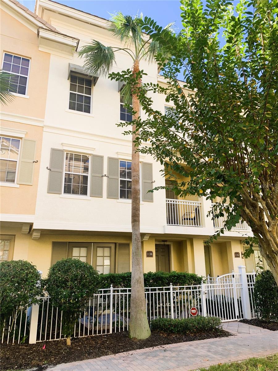 Welcome to Grande Oaks at Heathrow! This meticulously maintained 3 bedroom, 3.5 bathroom townhouse in the highly sought-after area of Lake Mary is waiting for you! Close to 2300 square feet, this spacious and open floor plan is the original Magnolia signature model. Built to last, this townhome features concrete block construction on all three floors, poured concrete floors, and steel framing, delivering structural integrity and peace of mind. Passing through the charming front patio and entering the first floor, is the spacious BONUS ROOM that includes a full bathroom, convenient under-stair storage, and direct access to the garage. This flexible space provides endless possibilities to accommodate your needs. Whether you envision it as a home office, game room or additional bedroom, the French doors that open to the patio, create a seamless indoor-outdoor flow. The second floor serves as the main living and entertainment area featuring a grand living room, dining area, kitchen, Butler’s pantry, half bath and TWO balconies! The spacious living room allows for various furniture arrangements and possibilities as the French doors that open to the balcony overlooks the courtyard. The natural light compliments the warm tones of the kitchen and over-sized dining area that flow to a second balcony where you can relax and soak up the sun while enjoying coffee or yoga. The kitchen features 42” espresso wood cabinets, sleek granite countertops, stainless steel GE appliances, under-cabinet lighting, and a large walk-in pantry. The primary suite, two additional bedrooms, a full bathroom and laundry closet are on the third floor. The substantial size primary suite allows for a future sitting area alongside large bedroom furniture. The walk-in closet is generous in size with a window to make it bright and inviting. The luxurious en-suite bathroom features dual vanities, espresso cabinets, Corian countertops, garden tub, shower and private water closet. Items to note: Roof (HOA is replacing), A/C handler (2017), electric water heater (2019), Piped for whole home Central vacuum, 8 foot doors, Newer washer and dryer, home security system monitored by Nationwide, GREAT location inside the community. With resort-style amenities, at Grande Oaks at Heathrow you can enjoy the pool, hot tub, fully equipped fitness center, clubhouse, playground, paved sidewalks, and a scenic pedestrian bridge over the pond with beautiful lighted fountains. LOCATION! LOCATION! Convenience at its finest! Walk to COLONIAL TOWNPARK shopping center to watch a movie, dine at one of the numerous restaurants or enjoy a day of shopping. Zoned for some of the best schools in Seminole County! Destinations like Disney, the airport, Orlando, and the beach are easily accessible with this being close to the I-4, 417, and the 429. Call to make your appointment to view today!