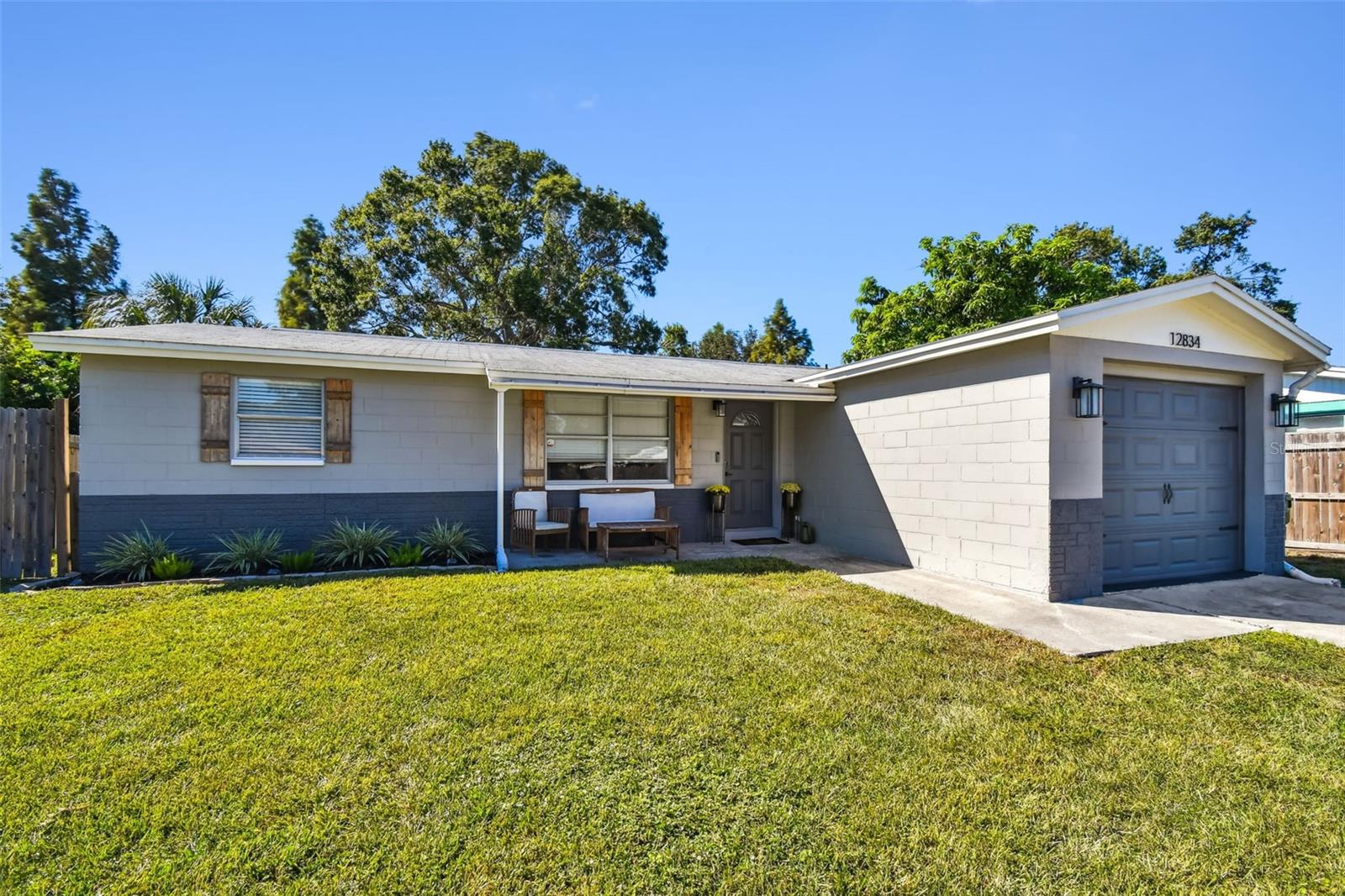 Welcome to this amazing home in Largo. Large fenced in backyard and backs up to small Lake. Location Location Location! Just around the corner to all the shopping at Largo Mall, Publix, Target, Staples and Restaurants. Home Depot and Lowes, just minutes away. This totally remodeled quaint 3-bedroom, 1 bath has been updated from floor to ceiling in every room. All new paint inside and out, all new Doors, Trim, Baseboard, Kitchen with granite counter tops, appliances replaced in 2022, washer and dryer (2022) conveniently located in garage. Luxury Vinyl Flooring throughout the whole house. Bathroom has new vanity, toilet and fixtures. All new ceiling fans and light fixtures. New garage door and motor in 2022. Nice storage shed in back yard will convey. New 200 amp Electrical box installed 10/25. 4pt inspection complete, no surprises. New Roof (with a 10-year warranty that transfers to new owner) will be replaced the week of Nov 7th. This is truly a move in ready home with all the updates and care they have put in their home.