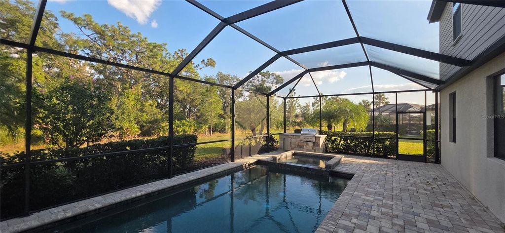 Photo of 16333 Tradewind Terrace, Bradenton, FL 34211 (MLS # A4672970)